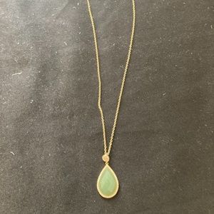 Gold necklace, with green stone pendant